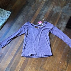 Purple cross back sweater.